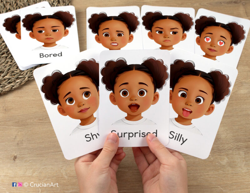 Flashcards featuring girly watercolor illustrations of Surprised, Shy, and Silly girl emotions and feelings in toddler hands. Version for African American girls with brown skin and hair.