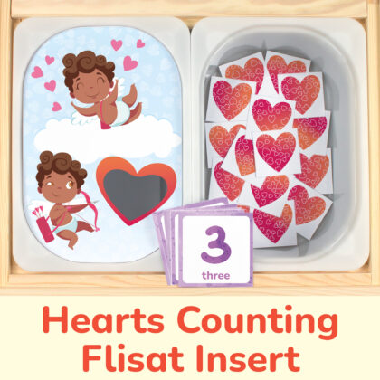 Valentine's Day brown skin and hair Cupid insert and hearts counters placed on Trofast boxes in IKEA Flisat Children's Sensory Table