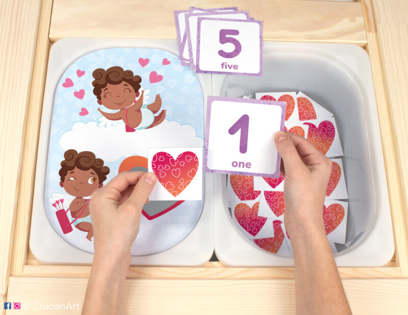 Flisat insert resource in a Montessori preschool: early math counting activity for a Valentine's Day unit placed on an IKEA Children's Sensory Table.
