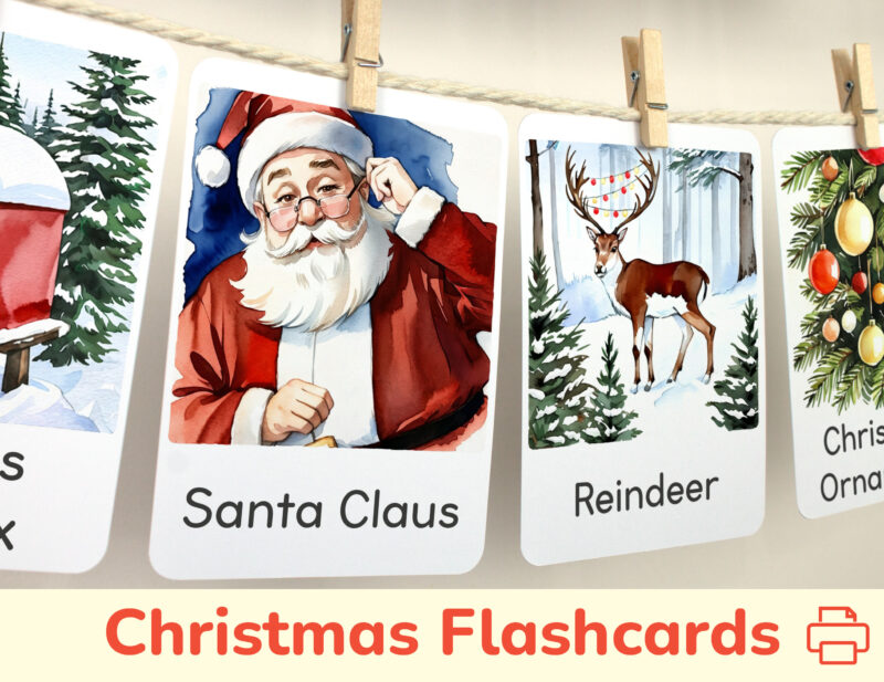 Santa Claus and Rudolph Reindeer watercolor flashcards hanging on twine with small wooden clothespins. Christmas Holiday curriculum classroom resources.
