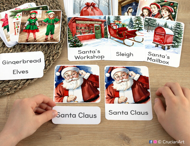 Christmas three part cards in use: preschooler matching a word label to an image card of Santa Claus. Printables for Winter Holiday curriculum classroom resources.