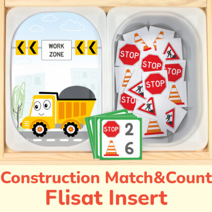 Dump Truck insert and Road Signs counters placed on Trofast bins in the IKEA Flisat Children's Sensory Table.