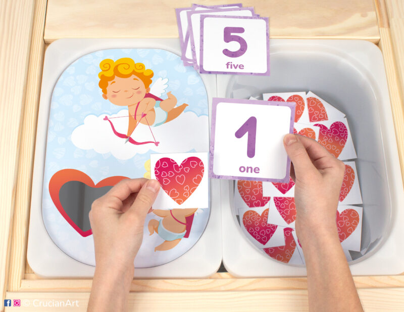 Flisat insert resource in a Montessori preschool: early math counting activity for a Valentine's Day unit placed on an IKEA Children's Sensory Table.