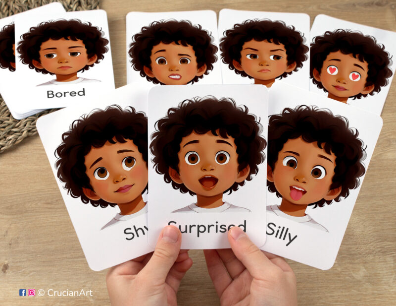 Flashcards featuring girly watercolor illustrations of Surprised, Shy, and Silly boy emotions and feelings in toddler hands. Version for African American boys with brown skin and hair.