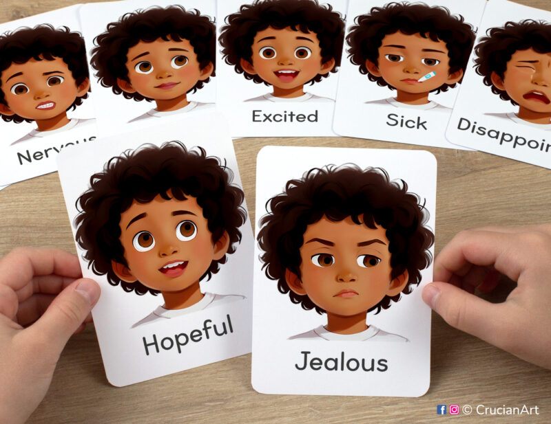 Watercolor illustrations of Jealous and Hopeful Emotions flashcards in kindergartener hands. Emotions and Feelings set of visual cards for African American boys with brown skin and black hair.