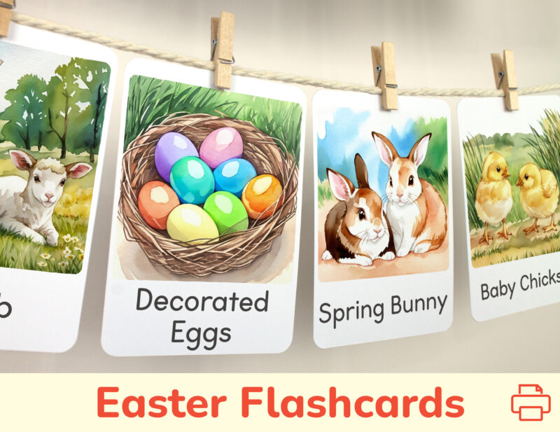 Easter Eggs and Easter Bunny flashcards hanging on twine with small wooden clothespins.