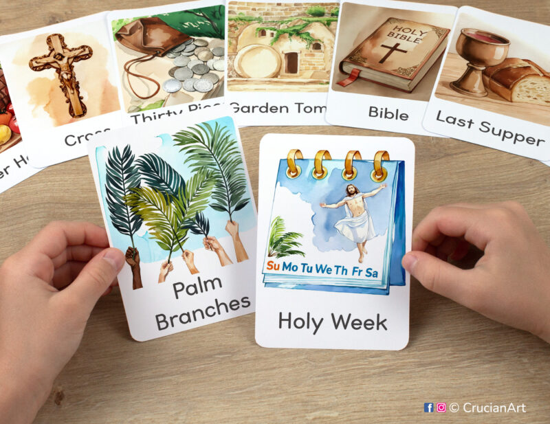 Preschooler's hands holding flashcards with images of Holy Week and Palm Branches for Palm Sunday