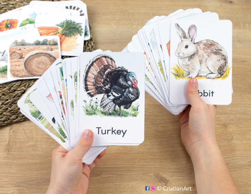 Rabbit and Turkey watercolor flashcards in child hands. Farm Animals unit preschool educational printables for autumn curriculum.