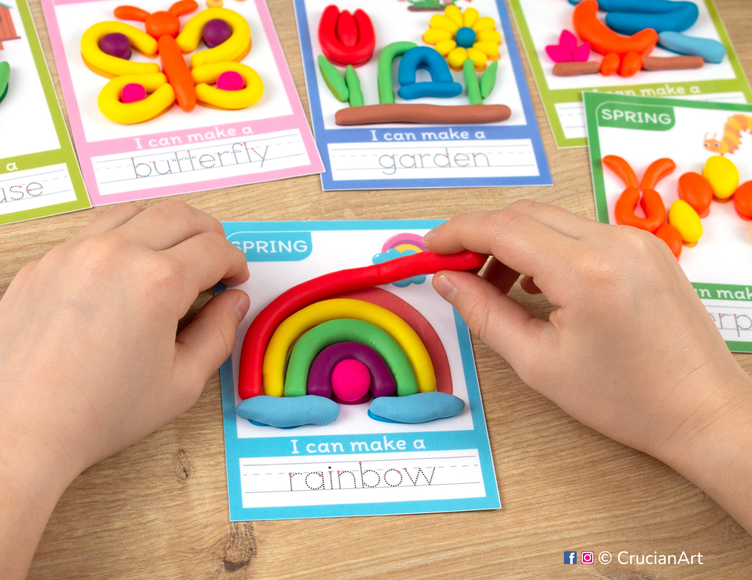 A preschooler is playing with play-doh, molding a rainbow. Spring season Montessori-inspired playdough mats for toddlers fine motor skill development.