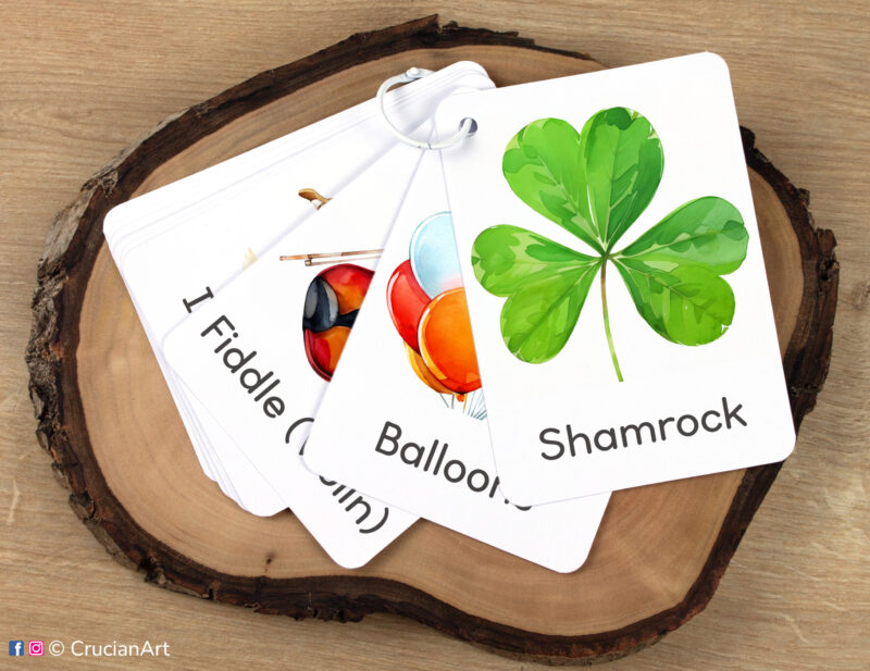 Set of St. Patrick's Day watercolor flashcards kept together on a ring for on-the-go learning.