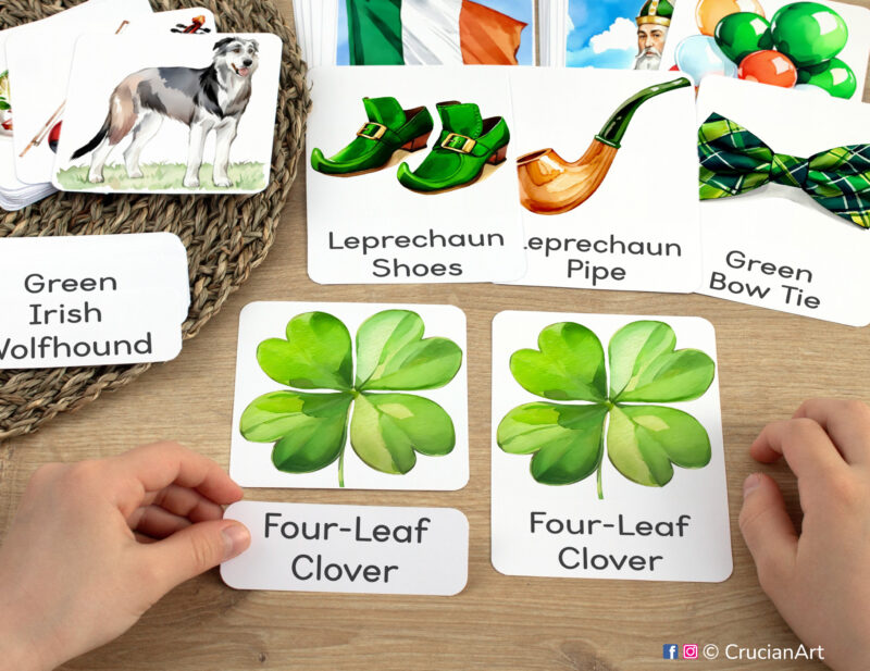 Three-part cards in practice: toddler pairing a word label with corresponding Four-Leaf Clover image card. Saint Patrick Day themed printable materials for holiday week and spring unit classroom activities.
