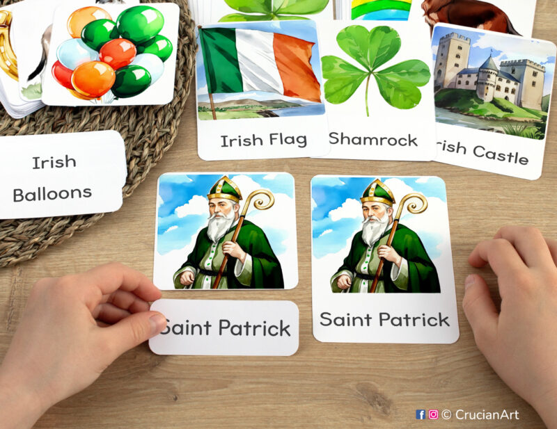 Three part cards in use: preschooler matching a word label to an image card of Saint Patrick. St. Patrick's Holiday. Printables for Spring curriculum classroom resources.