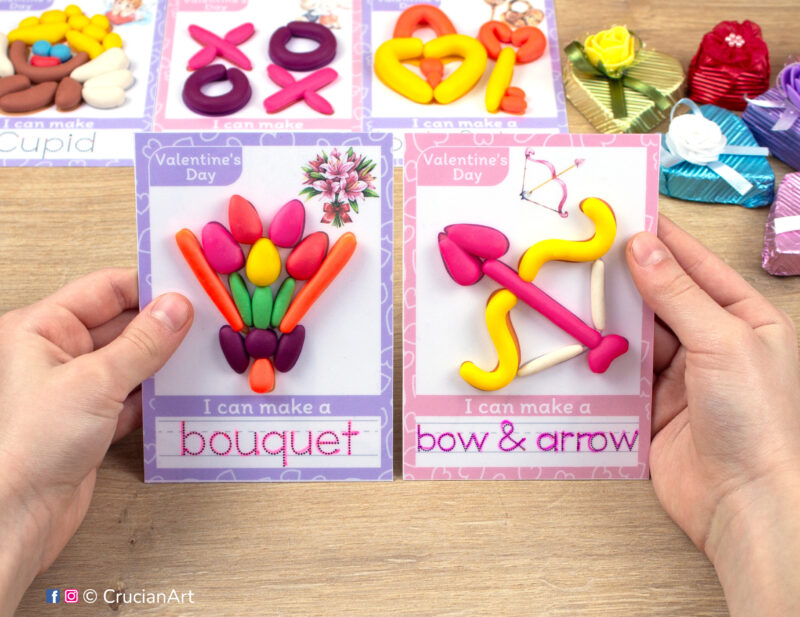 Saint Valentine Day hands-on playdough activities for preschool and toddler curriculum. Preschooler holds two play doh mats with images of Bouquet and Bow and Arrow.