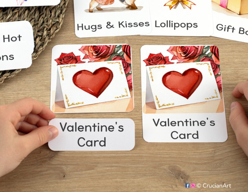 Saint Valentine Day three part cards in use: preschooler matching a word label to an image card of Valentines Card. Printables for winter holiday curriculum classroom resources.