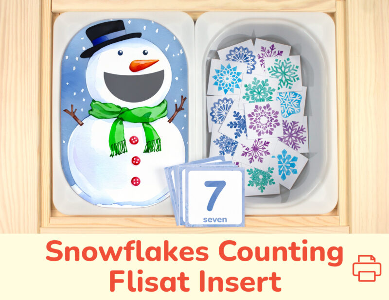 Snowman insert and snowflake counters placed on Trofast boxes in IKEA Flisat Children's Sensory Table