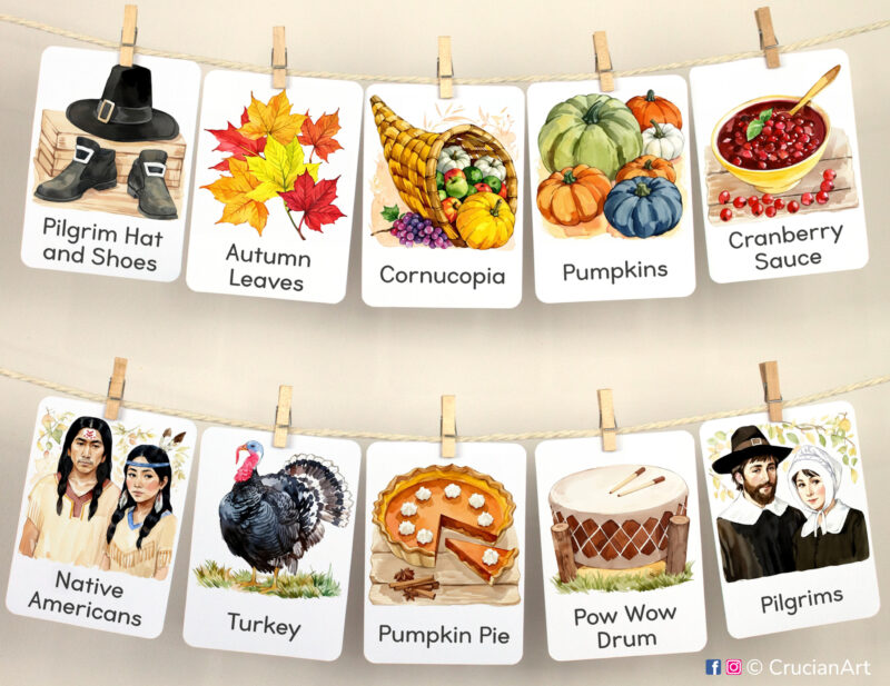 Set of Thanksgiving Day Season watercolor flashcards used as class or homeschool wall decor. North American Fall Holiday visual flash cards hang on twine with small wooden clothespins. Images of Pilgrims, Native Americans, Autumn Leaves, Cornucopia.