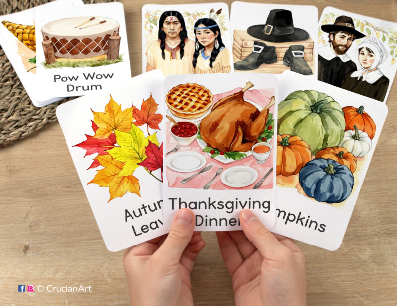 Flashcards featuring watercolor illustrations of Thanksgiving Dinner, Autumn Leaves, and Pumpkins in toddler hands. Printable set of North American Autumn Holiday themed visual cards.