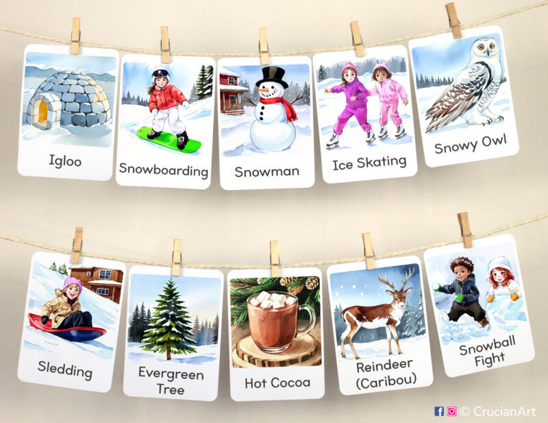 Set of Winter Wonderland theme flashcards used as class or homeschool wall decor. Flash cards hang on twine with small wooden clothespins.