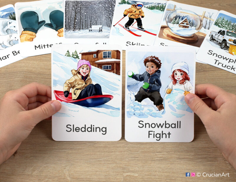 Sledding and Snowball Fight watercolor flashcards in child's hands. Winter Season unit educational printables.