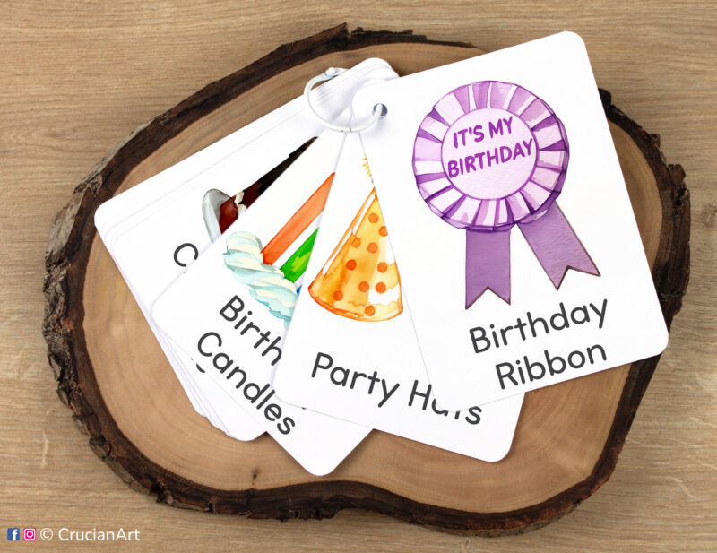 Set of birthday party flashcards kept together on a ring for on-the-go learning