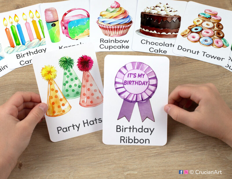 Birthday party themed watercolor illustrations of birthday ribbon badge and party hats flashcards in kindergartener hands. Printables for classrooms.