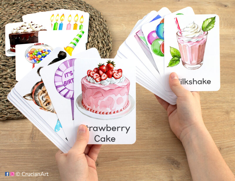 Birthday strawberry cake and milkshake watercolor flashcards in child hands. Happy Birthday unit educational printables for three and four year old kids.