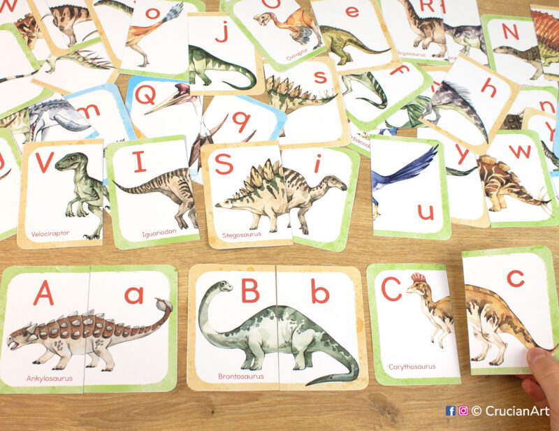 Dinosaur alphabet printable set of picture puzzles for preschool and kindergarten teachers. Watercolor puzzle pairs with images of a brontosaurus, corythosaurus, ankylosaurus, stegosaurus, velociraptor, iguanodon.