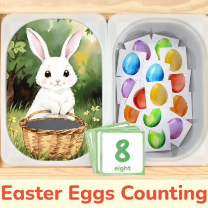 Easter bunny insert and Easter eggs counters placed on Trofast boxes in IKEA Flisat children's sensory table.
