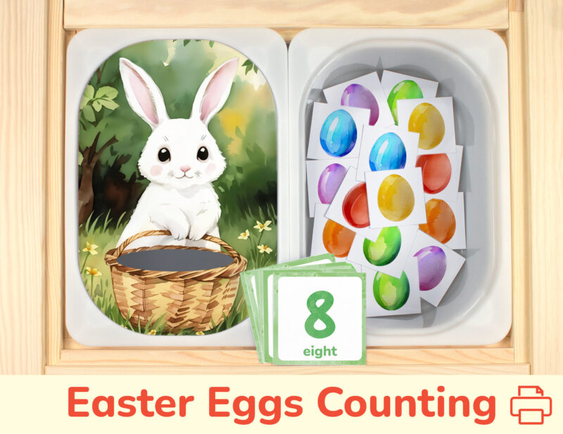 Easter bunny insert and Easter eggs counters placed on Trofast boxes in IKEA Flisat children's sensory table.