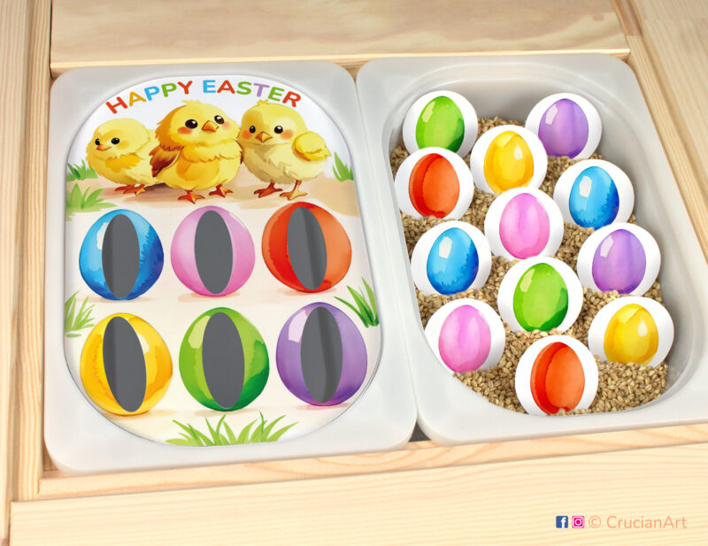 Easter pretend play setup for a color sorting game. Easter chicks themed sensory table insert and colored Easter eggs.