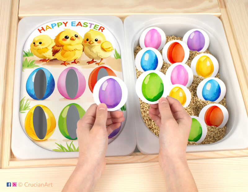 Easter holiday toddler play for sensory bins. DIY template inserted into IKEA Flisat table. Easter yellow chicks and colored Easter eggs sorting pieces placed in the Trofast box.