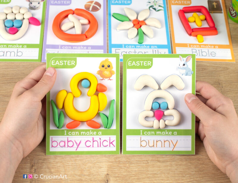 Easter hands-on play-doh activities for preschool and toddler curriculum. Preschooler holds two playdough mats with images of an Easter bunny and a baby chick.