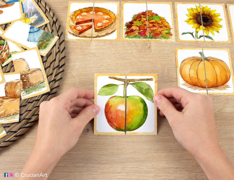 Kids puzzle matching activity in use: watercolor picture puzzle with an apple. Montessori printables for two year olds. Autumn season puzzles: pumpkins, pie, sunflower, leaf pile.