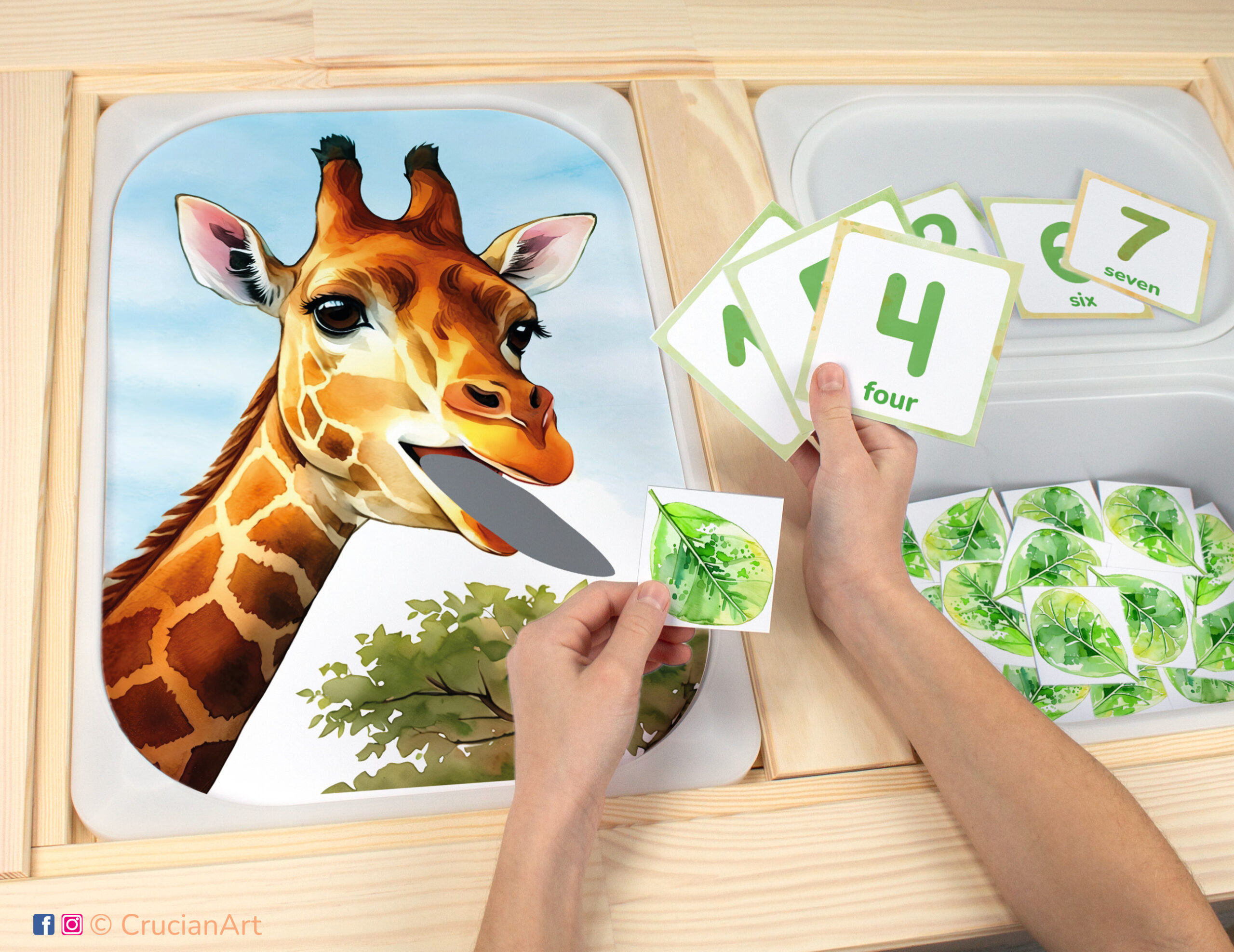 Feed the giraffe leaves sensory bins play for toddlers: African safari and savannah theme worksheet for an educational activity. DIY template inserted into ikea flisat table, with counters placed in the trofast bin.