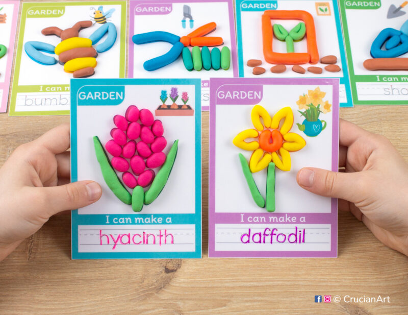 Spring Garden hands-on play-doh activities for preschool and toddler curriculum. Preschooler holds two playdough mats with images of a daffodil and hyachinth flowers.