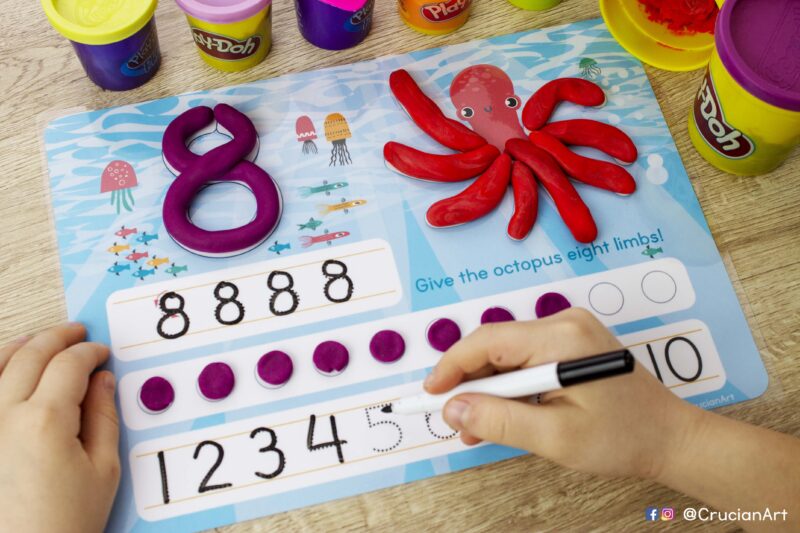 Numbers and counting playdough mats. play dough mat with an illustration of a red octopus with eight limbs. Do-it-yourself Number recognition and Number sequencing educational resources for childcare centers.