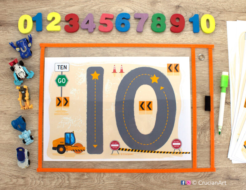 Construction trucks theme tracing mat placed into a dry erase pocket sleeve. Printable worksheet to learn how to write numbers.