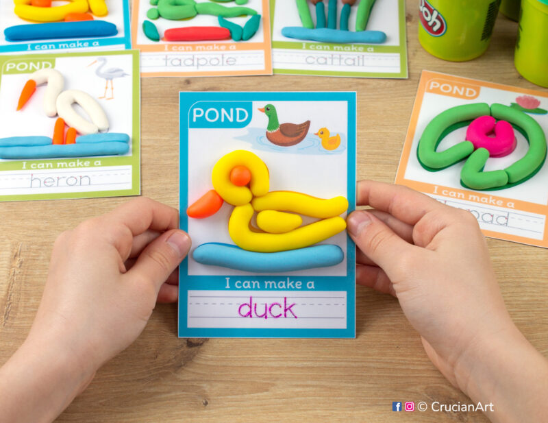 Pond Animals themed playdough mat with an image and word of a yellow duck made of play-doh. Educational playdough printables for spring early childhood curriculum.