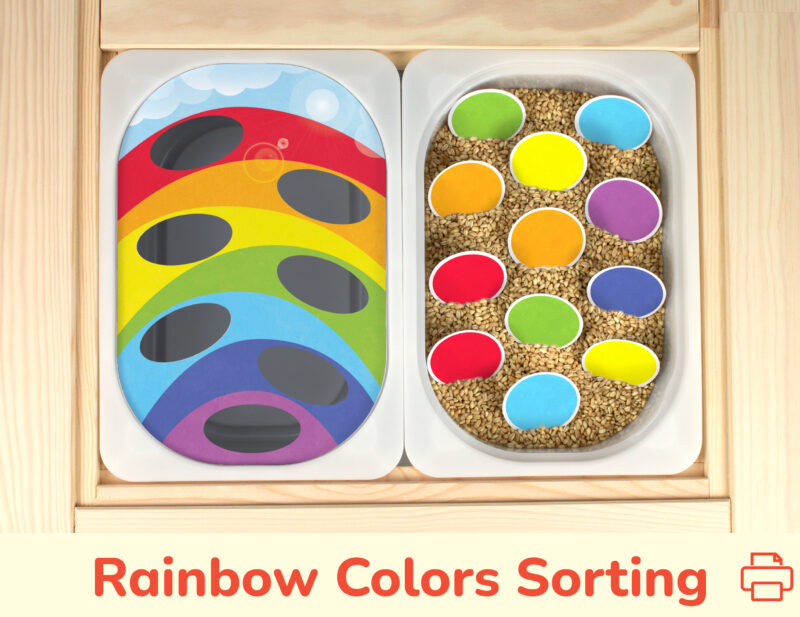 Colors of rainbow insert placed on Trofast sensory bins in IKEA Fflisat children's sensory table.