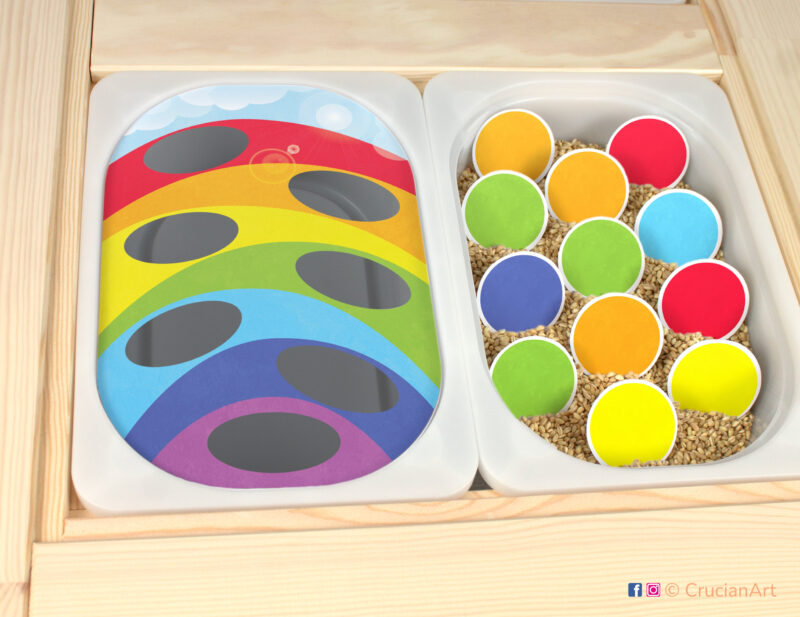 Rainbow colors pretend play setup for a color sorting game. Colors of rainbow themed sensory table insert. Printable template for ikea flisat sensory table bins for kids.