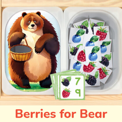 Feed the brown bear berries counting activity placed on trofast boxes in ikea flisat children's sensory table. Printable toddler activity for woodland animals study unit.