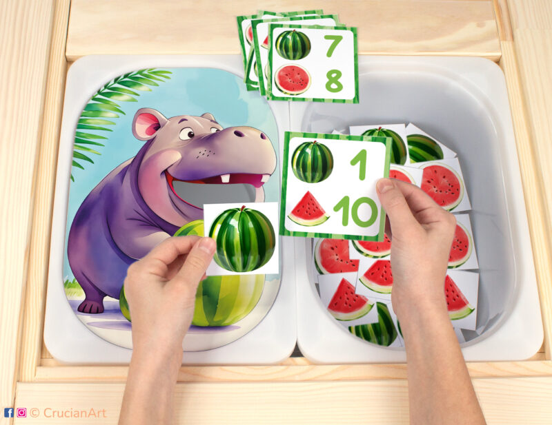 Let's feed the hippo with watermelon Flisat insert resource in a Montessori preschool. African safari animals theme early math counting activity placed on an IKEA children's sensory table.