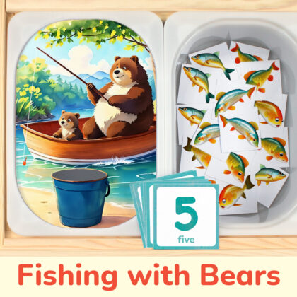 Fishing with bear cub themed preschool counting activity placed on trofast boxes in ikea flisat children's sensory table. Printable toddler activity for woodland animals unit.