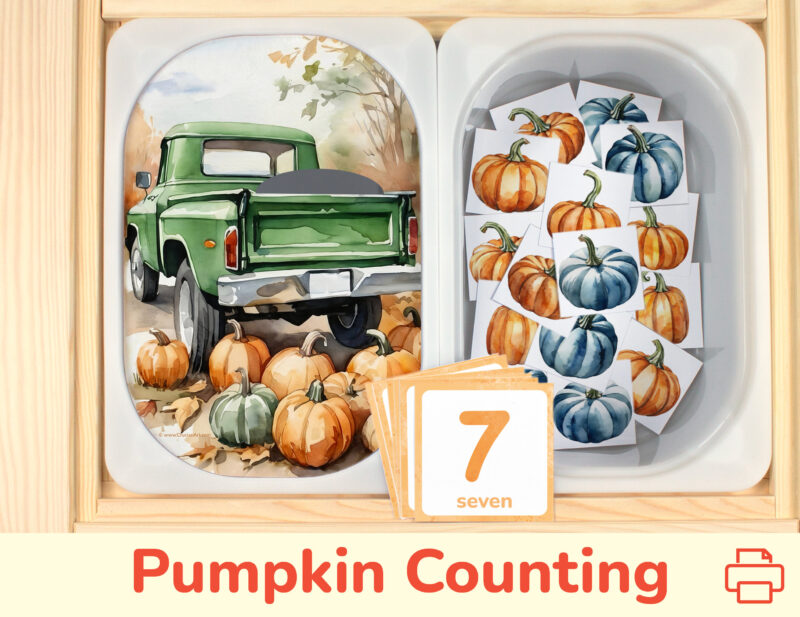 Pumpkin counting activity placed on trofast boxes in ikea flisat children's sensory table. Printable toddler activity for the fall harvest unit.