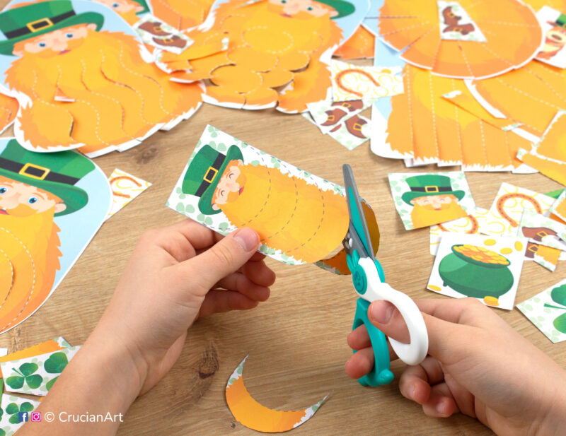 Little learners developing their cutting skills with Patrick beard themed scissor strips. Learning printables for Saint Patrick’s Day holiday season. DIY educational resource for preschool classrooms.