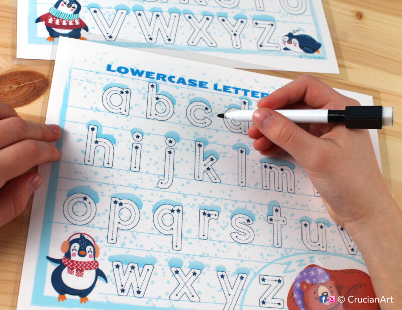 Lowercase letter tracing worksheets for children. Winter printable educational preschool activity.